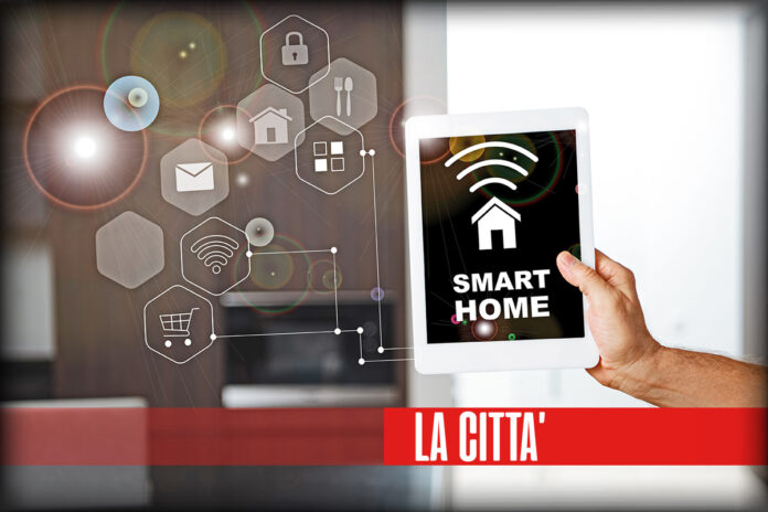 selective focus of male hand with digital tablet with smart home